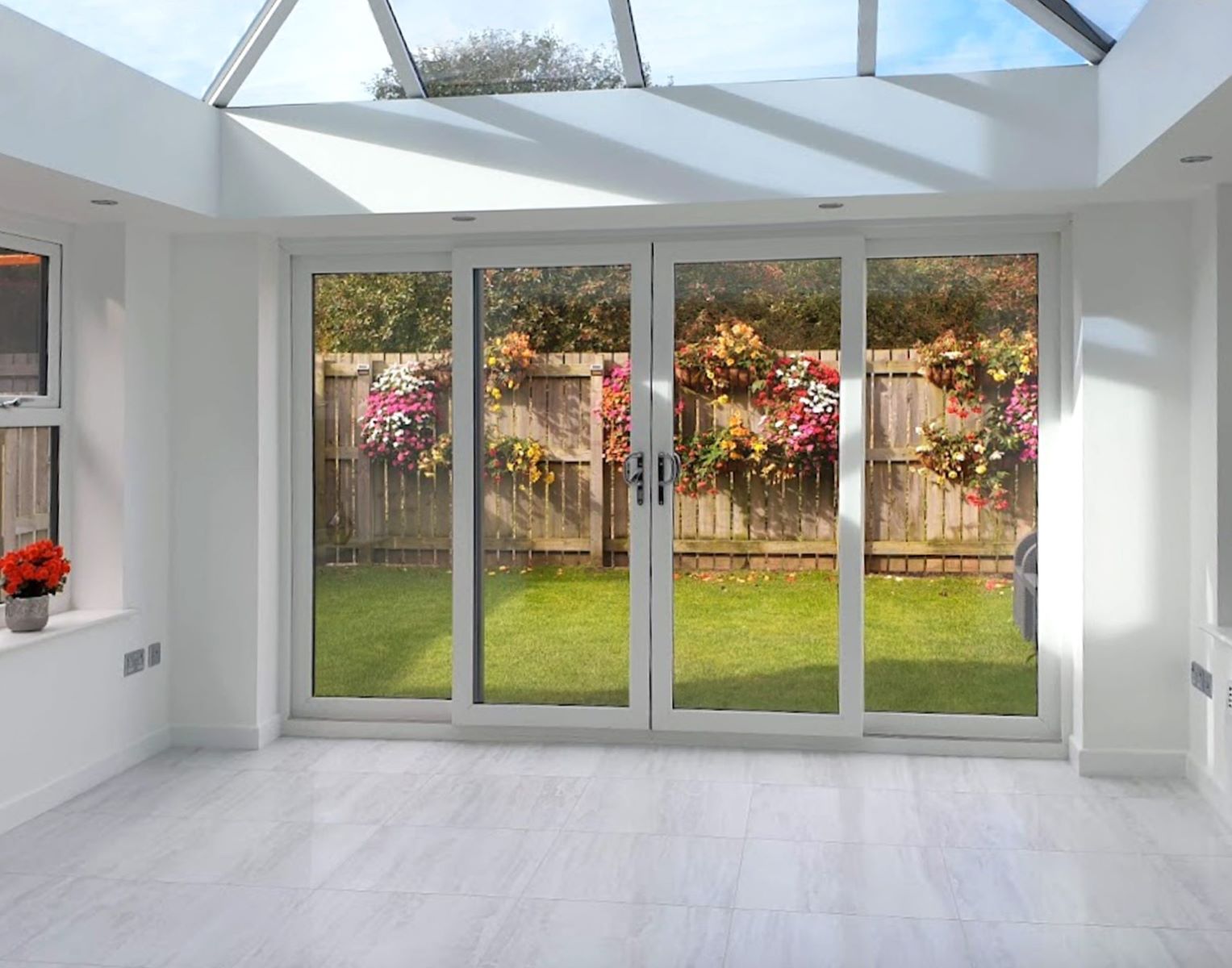 inside a bright orangery with sliding doors