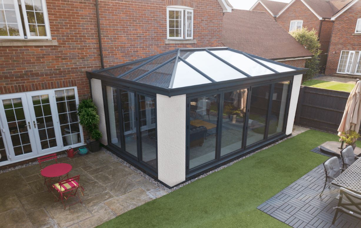 glass roof conservatory with sliding doors