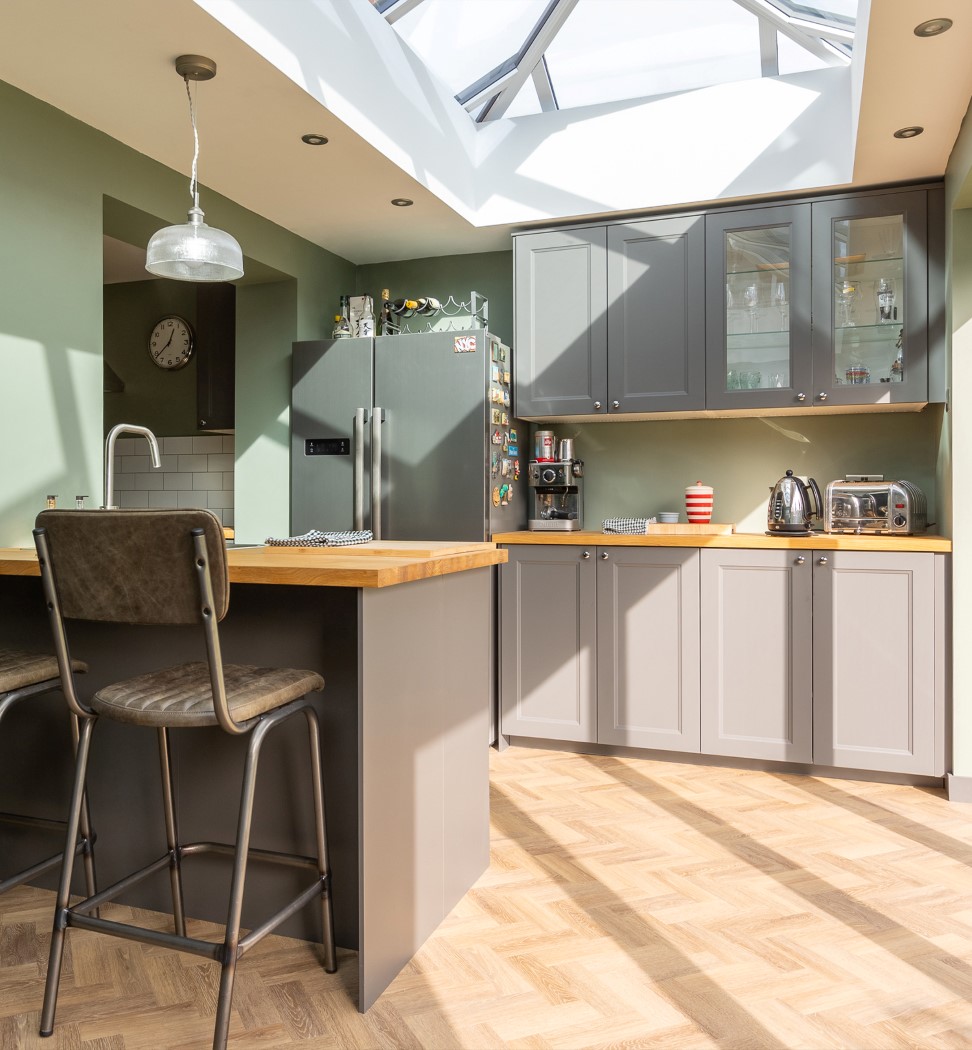 inside orangery kitchen extension with natural light from glass roof